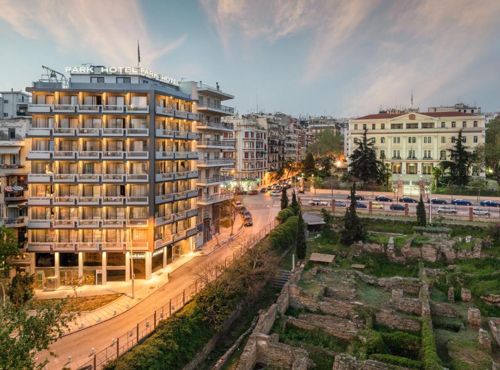 a building in a city with a street at Park Hotel in Thessaloniki