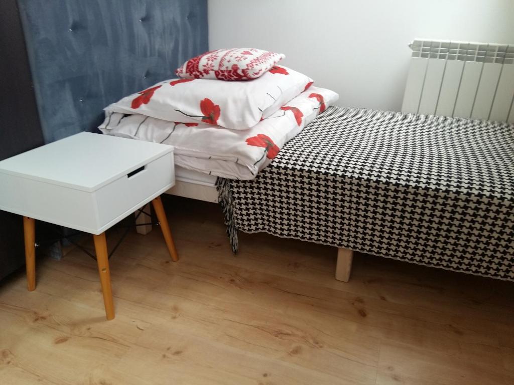 Posteľ alebo postele v izbe v ubytovaní Domek 87