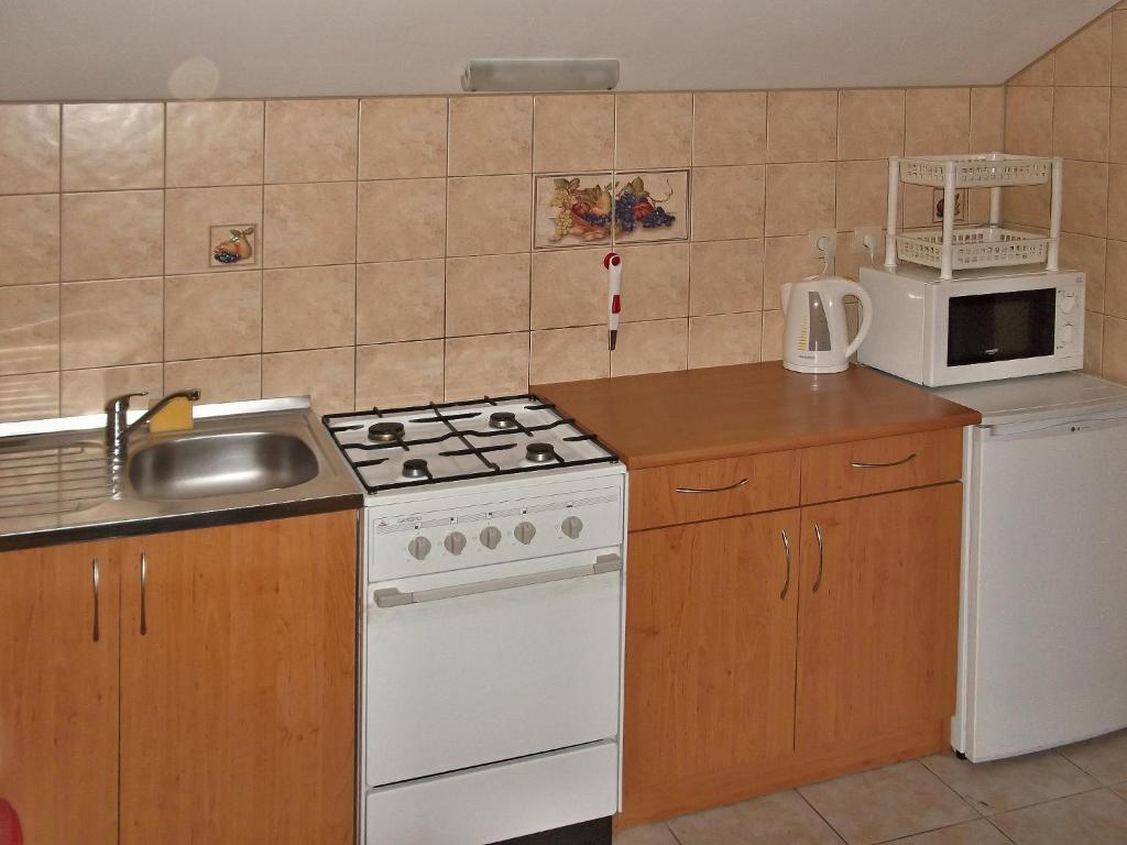 Kuchyň nebo kuchyňský kout v ubytování Windstille