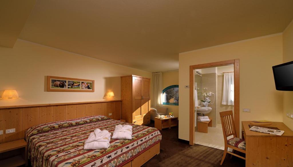 Postel nebo postele na pokoji v ubytování Hotel Sole