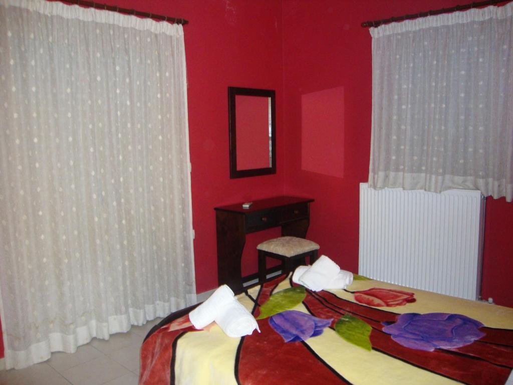 Postel nebo postele na pokoji v ubytování Kafiona Guesthouse