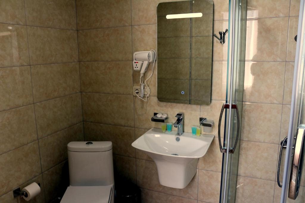 Koupelna v ubytování Hotel Lazi