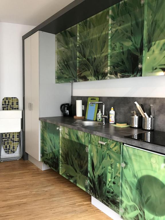 Kuchyňa alebo kuchynka v ubytovaní Szucha Apartments