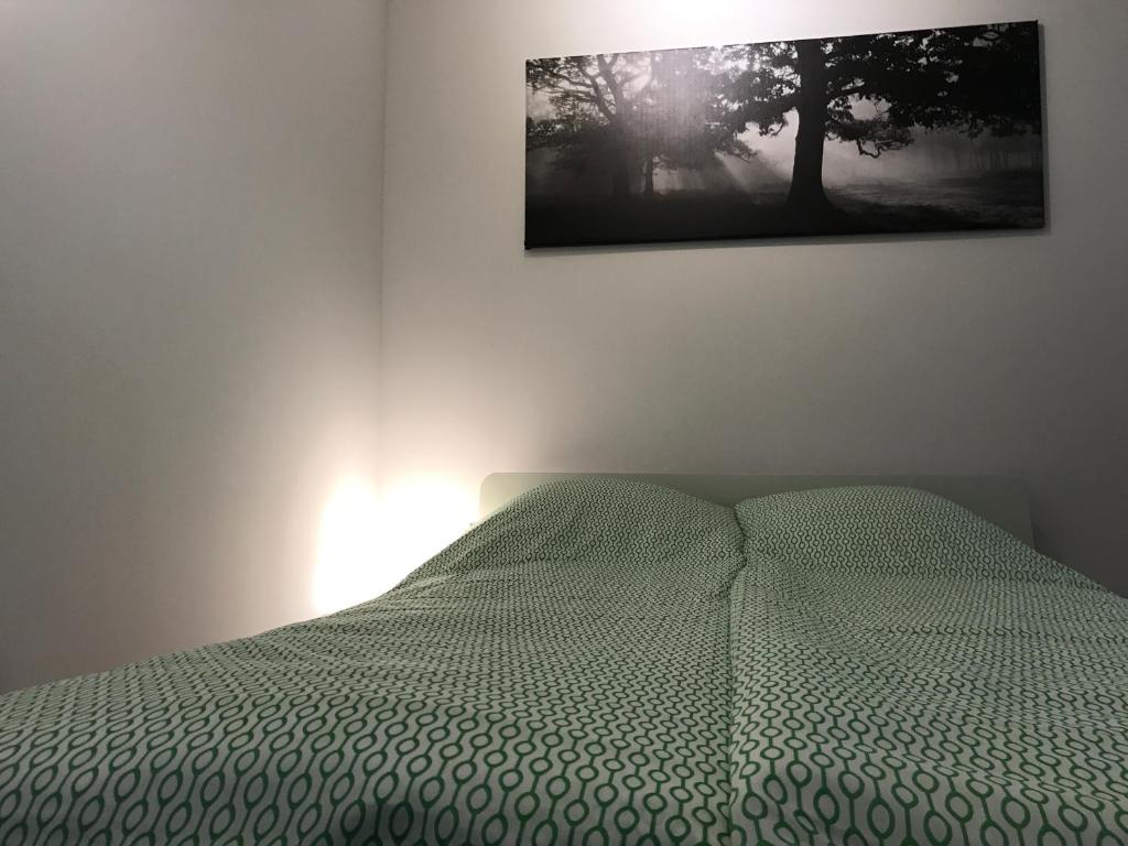 Posteľ alebo postele v izbe v ubytovaní Szucha Apartments