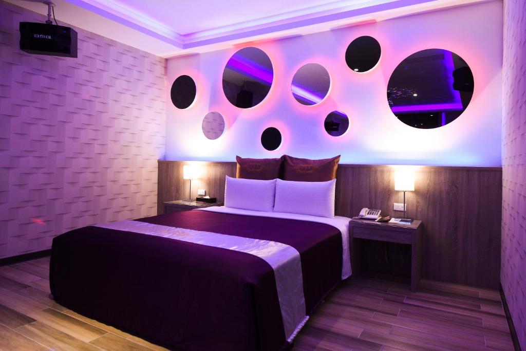 Postel nebo postele na pokoji v ubytování Belle Song Motel