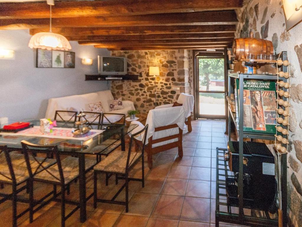 Catalan farmhouse with round pool in the middle of forest ...