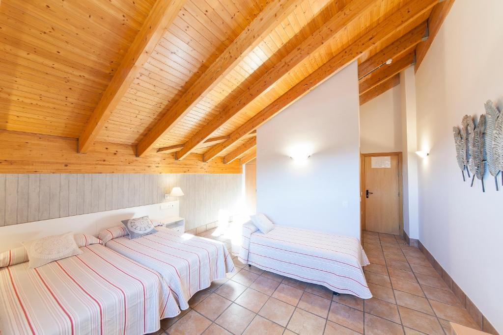 Postel nebo postele na pokoji v ubytování Hostal Pagozelai