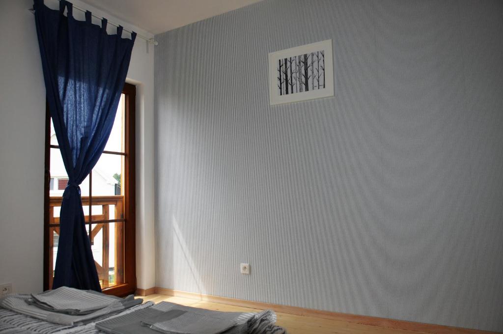 Posteľ alebo postele v izbe v ubytovaní Kubiczówka