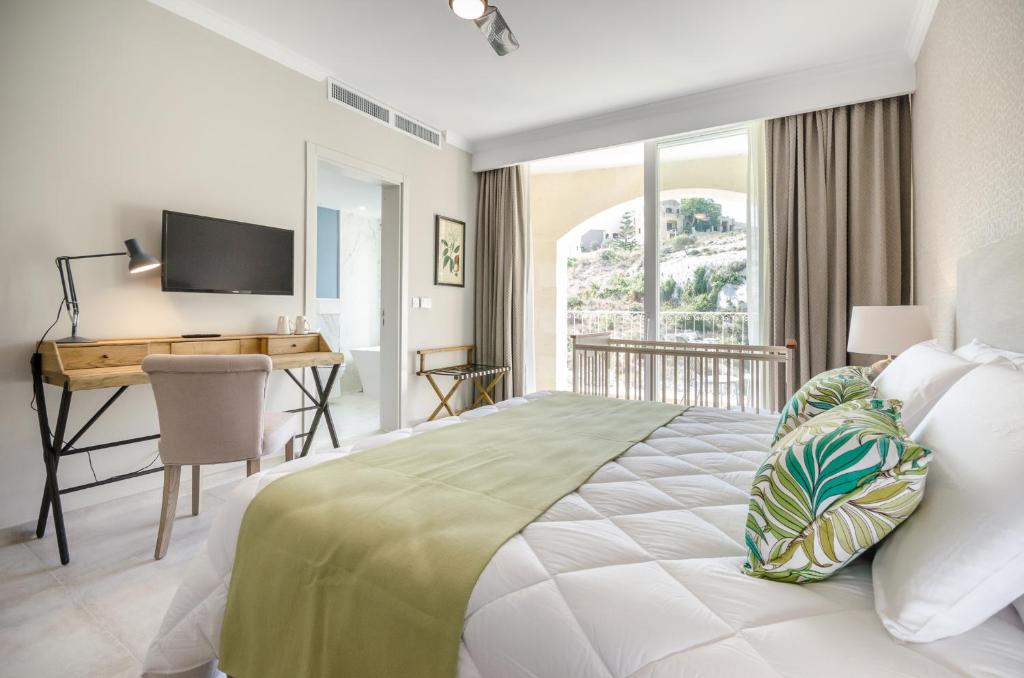 Postel nebo postele na pokoji v ubytování Cesca's Boutique Hotel