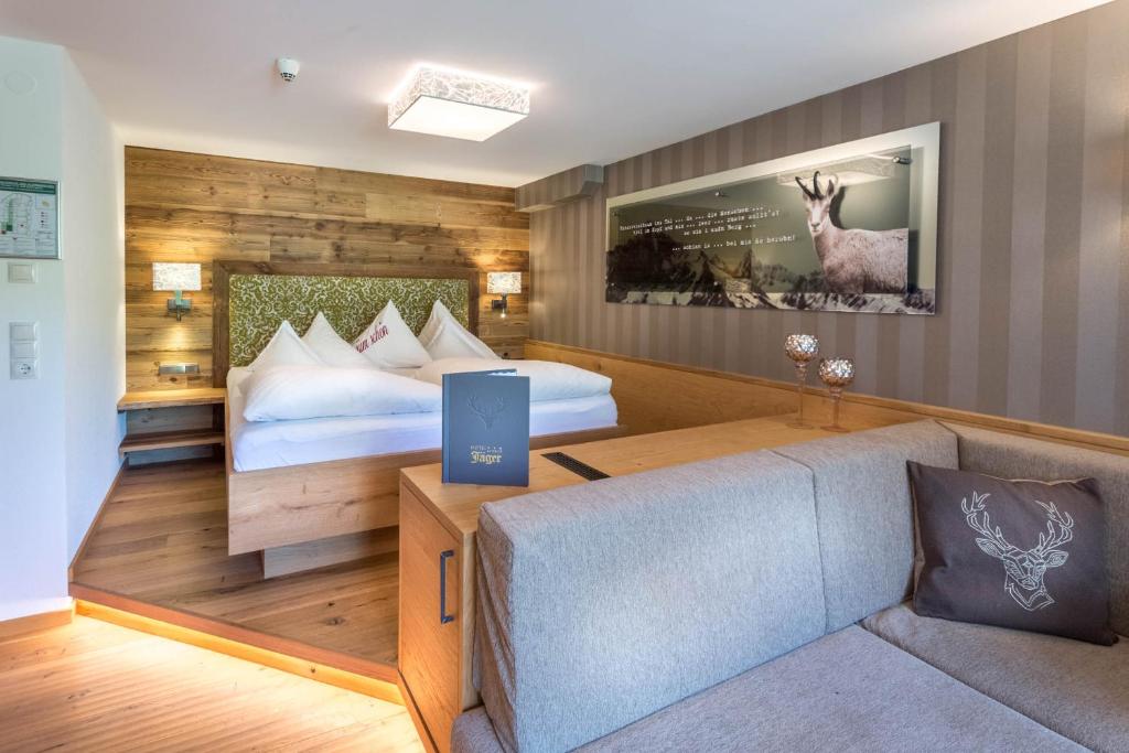 Postel nebo postele na pokoji v ubytování Hotel Jäger 3Sterne Superior