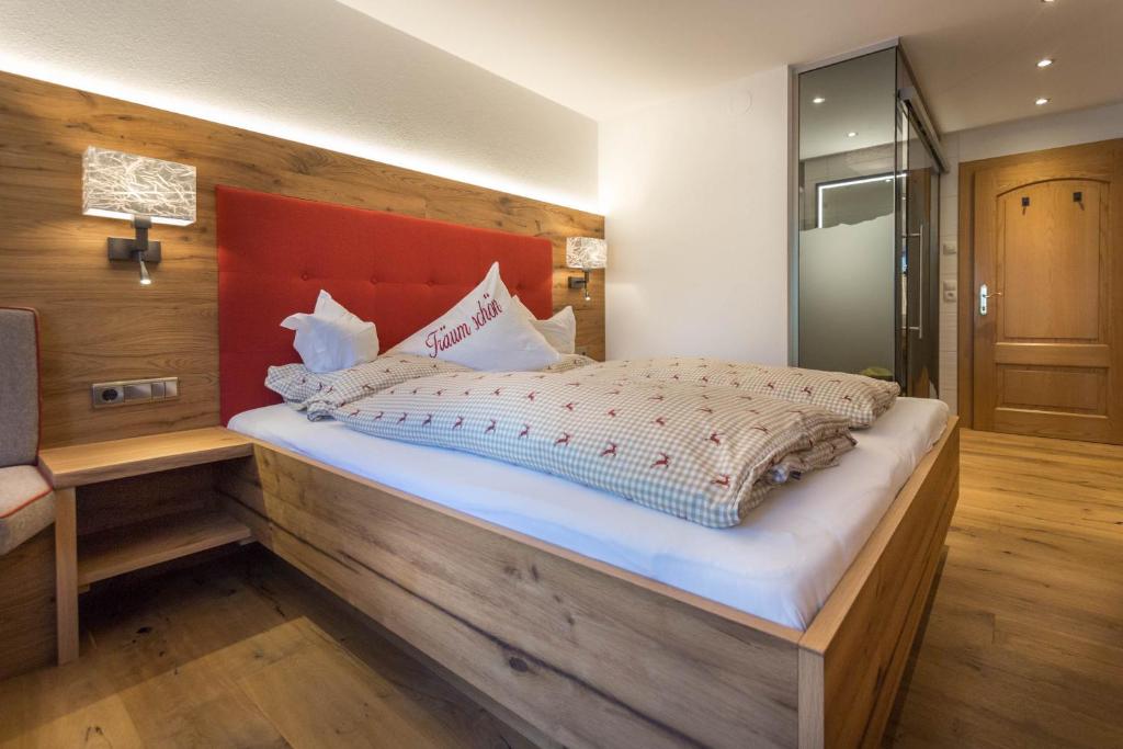 Postel nebo postele na pokoji v ubytování Hotel Jäger 3Sterne Superior