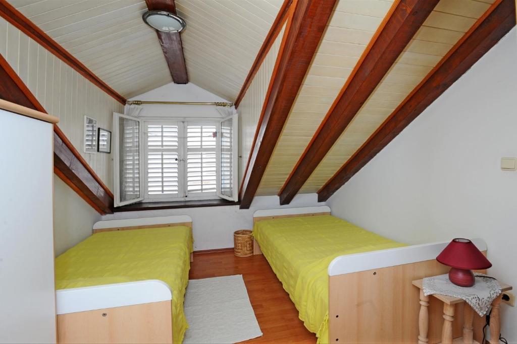 Postel nebo postele na pokoji v ubytování Apartment Maja