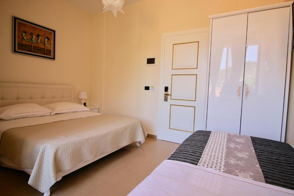 Llit o llits en una habitació de Hotel Orestiada