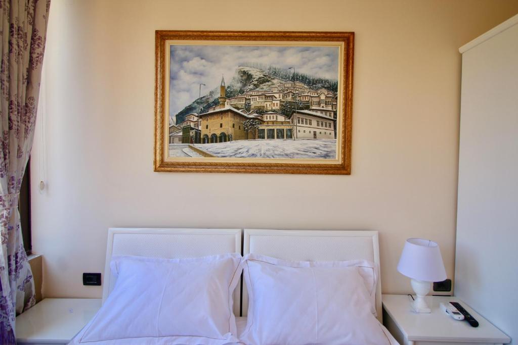 Llit o llits en una habitació de Hotel Orestiada