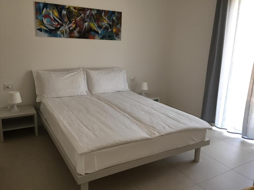 Posteľ alebo postele v izbe v ubytovaní Val Mora Bio Apartments