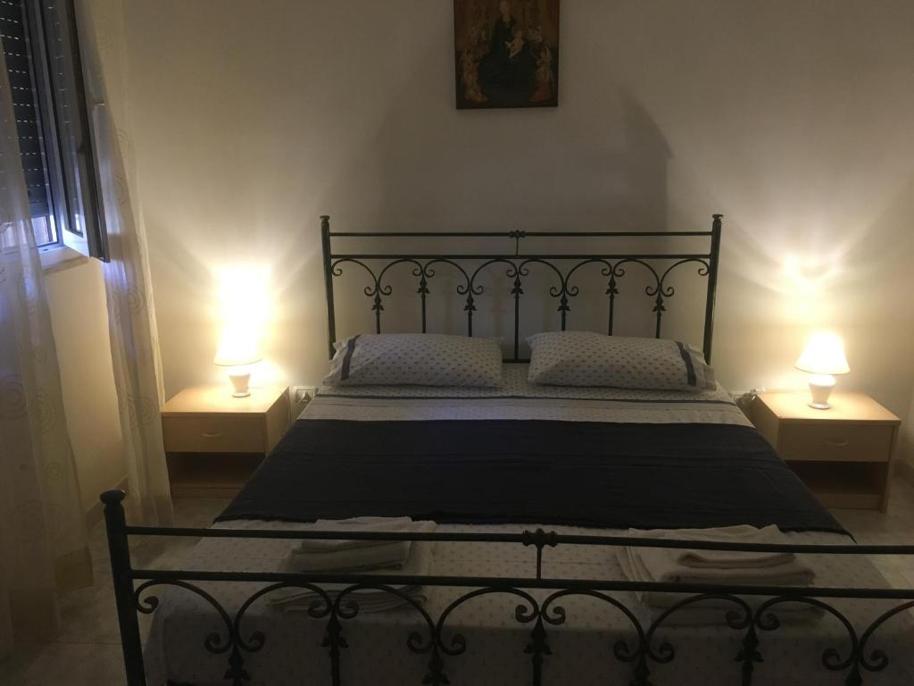 Postel nebo postele na pokoji v ubytování Casa Di Lo