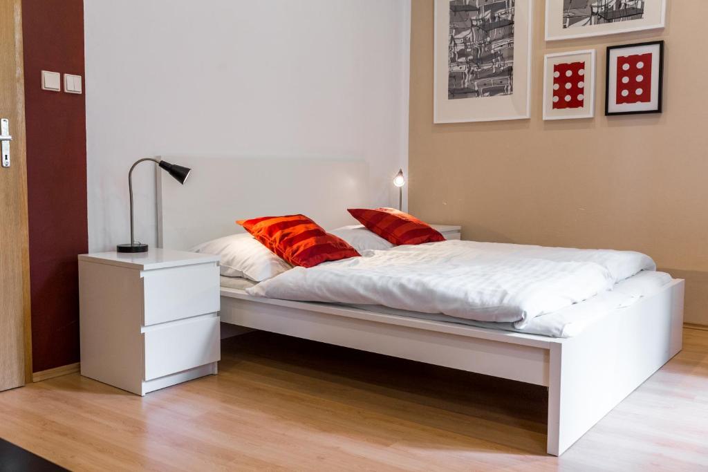 Postel nebo postele na pokoji v ubytování Apartmány Zadní mlýn