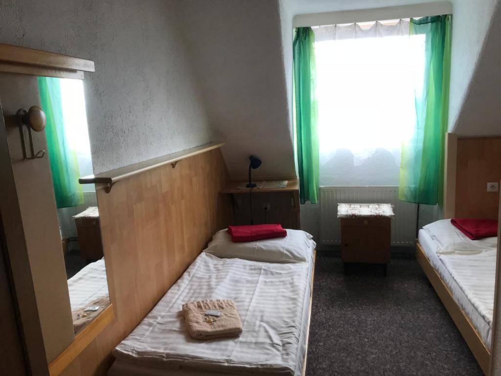 Postel nebo postele na pokoji v ubytování Hotel Chata