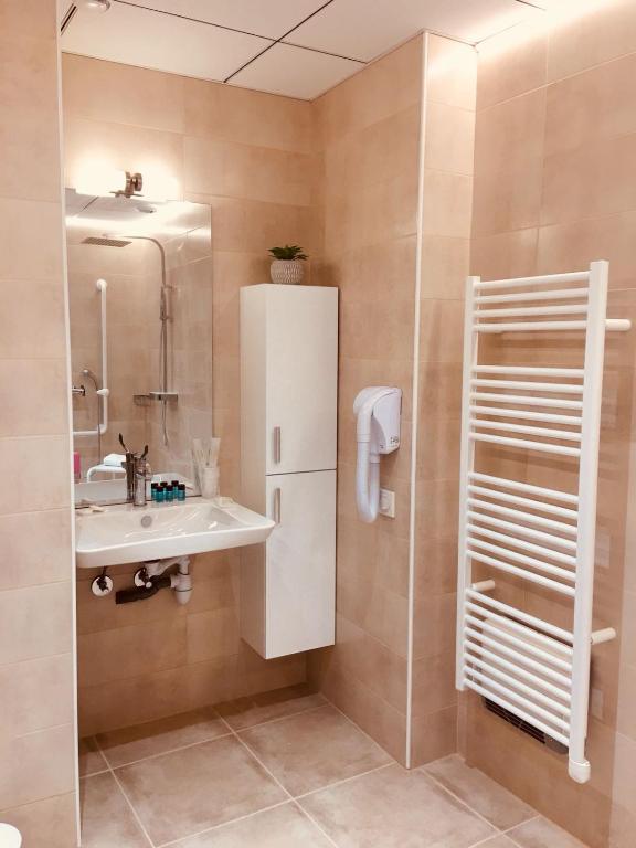 Koupelna v ubytování Hôtel Terranostra