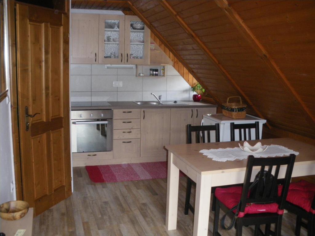 Kuchyň nebo kuchyňský kout v ubytování Apartment Cesar