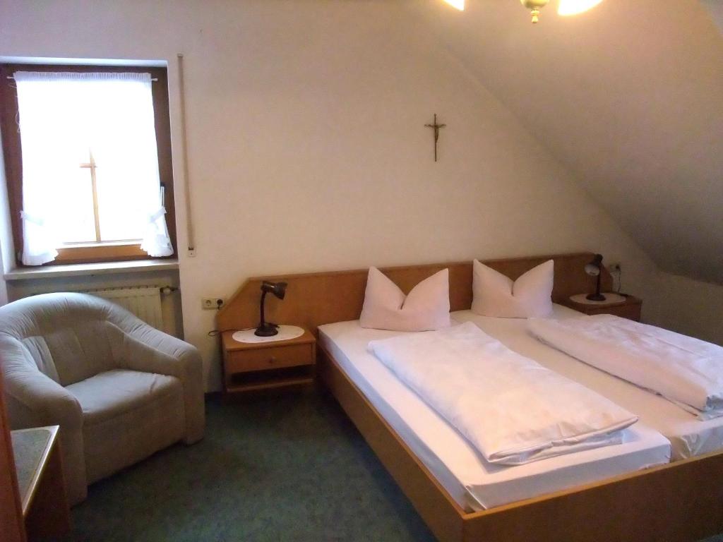 Postel nebo postele na pokoji v ubytování Gasthof Alte Post