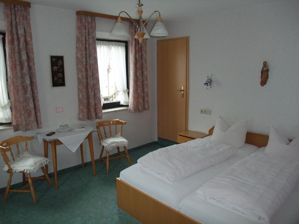 Postel nebo postele na pokoji v ubytování Gasthof Alte Post