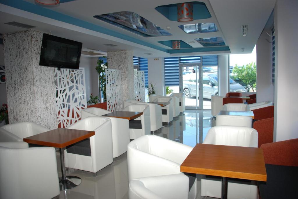 TV a/nebo společenská místnost v ubytování Summer Dream Hotel