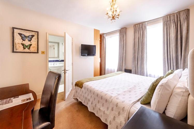 Postel nebo postele na pokoji v ubytování Fielding Hotel