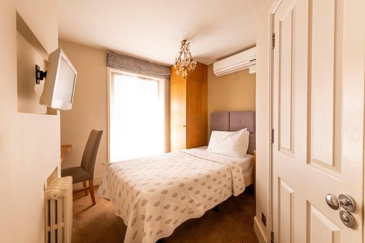 Postel nebo postele na pokoji v ubytování Fielding Hotel
