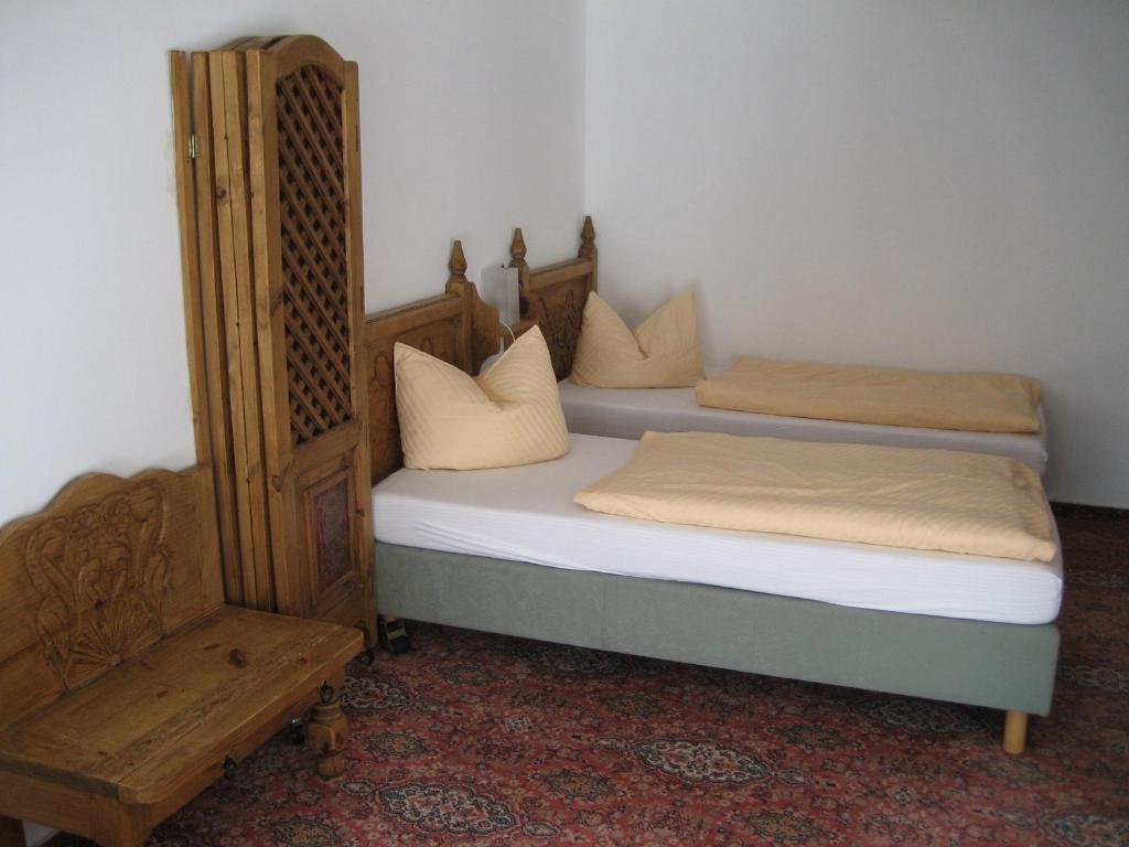 Postel nebo postele na pokoji v ubytování Solitaire Hotel