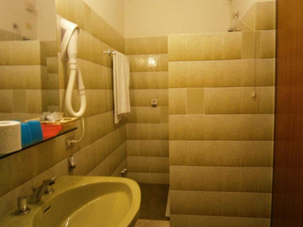 Koupelna v ubytování Hotel Chiara