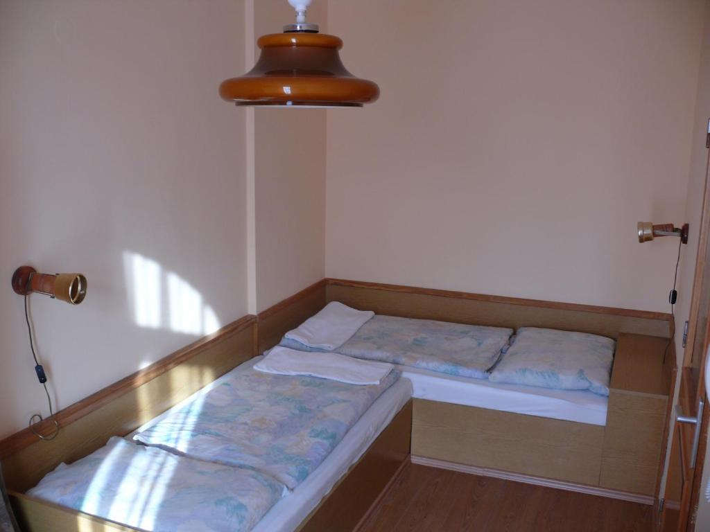 Voodi või voodid majutusasutuse Hotel Orchidea toas