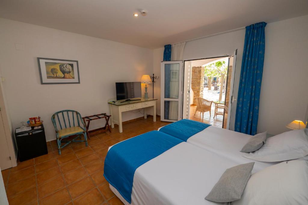 Postel nebo postele na pokoji v ubytování Hotel Calina