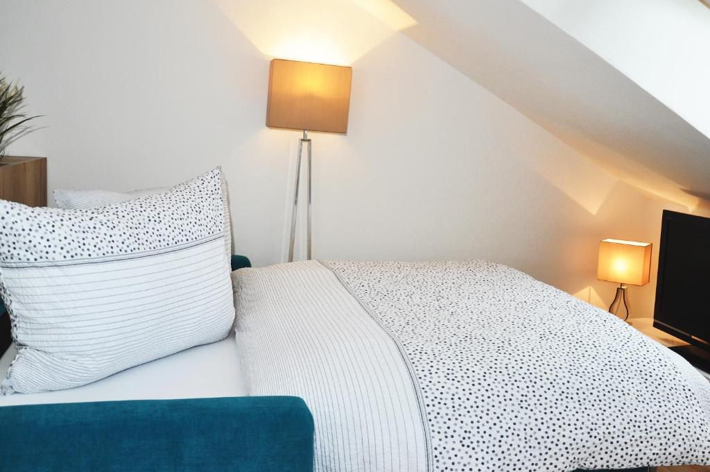 Postel nebo postele na pokoji v ubytování Apartmány Stožec - Gabreta Premium