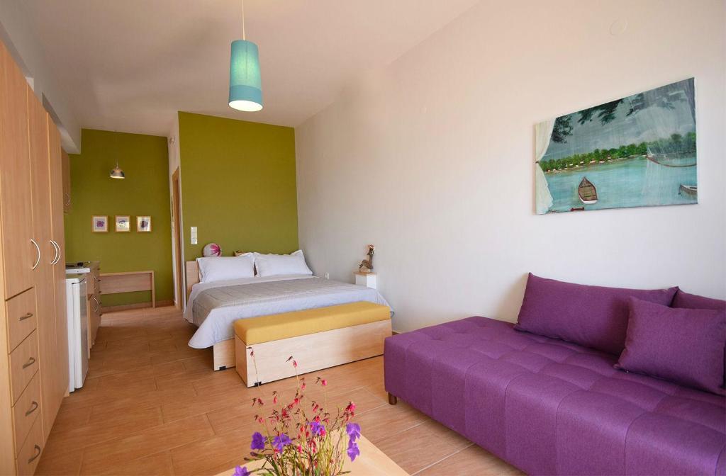 Postel nebo postele na pokoji v ubytování Elina Apartments