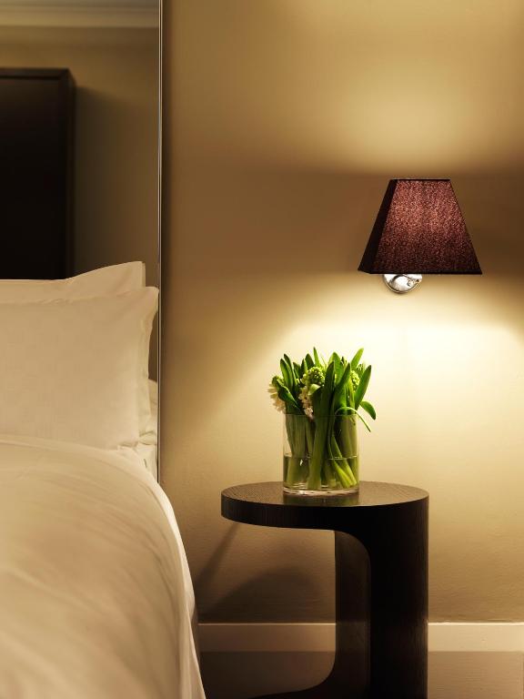 Postel nebo postele na pokoji v ubytování Kirketon Hotel Sydney
