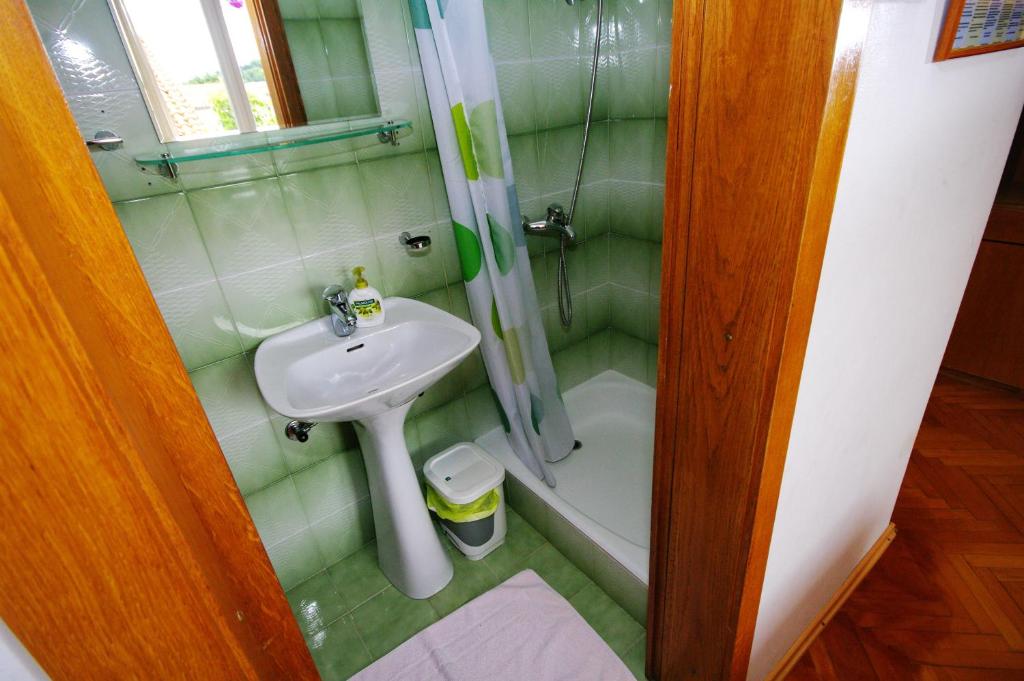 Koupelna v ubytování Rooms Ivka