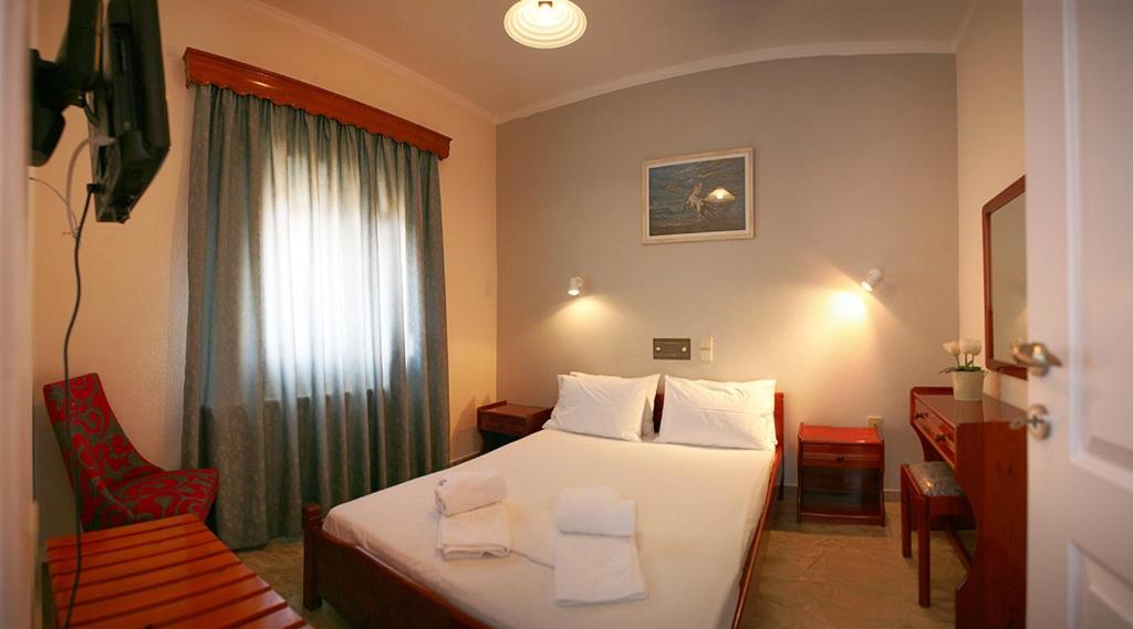 Łóżko lub łóżka w pokoju w obiekcie Gera Bay Studios And Apartments