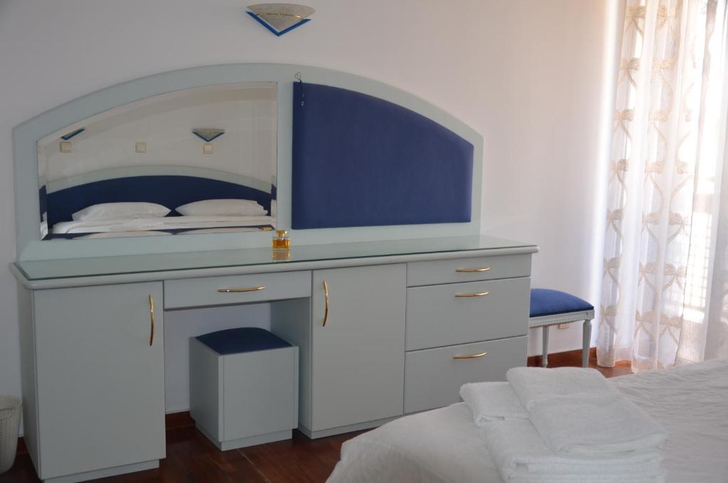 Posteľ alebo postele v izbe v ubytovaní Perfect BeachFront Apartment
