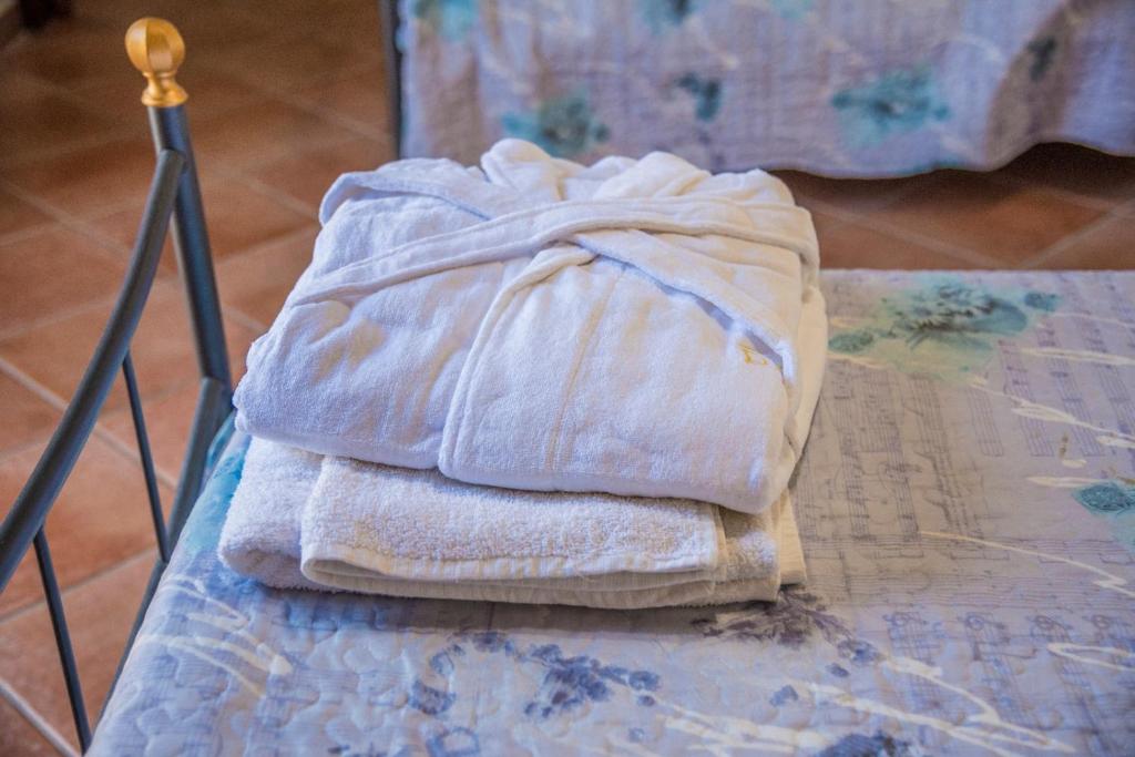 Postel nebo postele na pokoji v ubytování B&B Le Balate