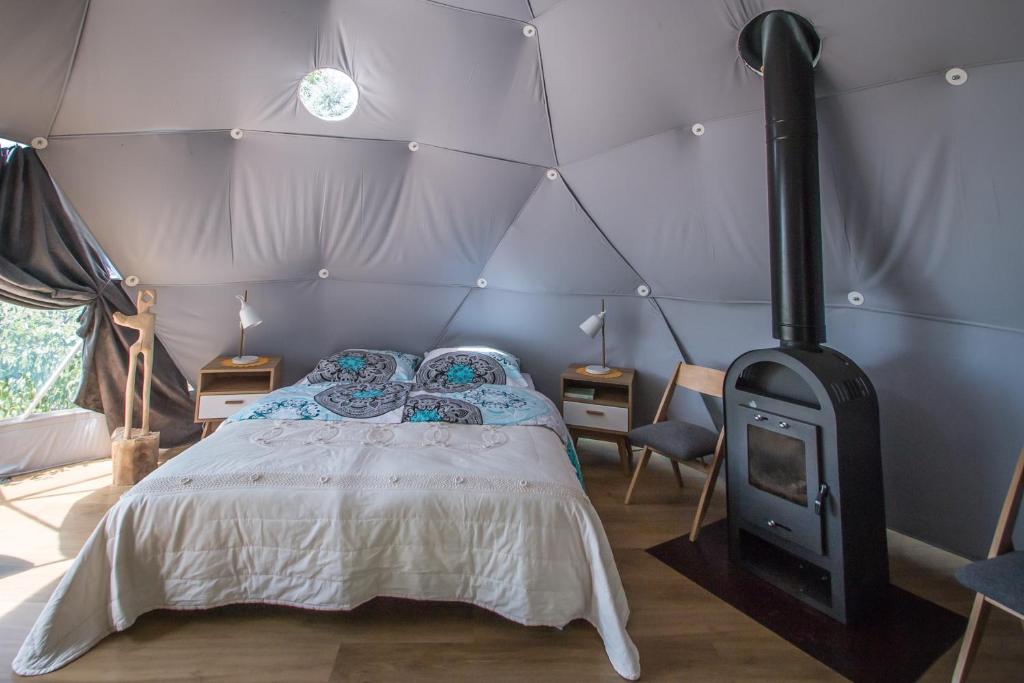 Postel nebo postele na pokoji v ubytování Glamping Podgrodzie