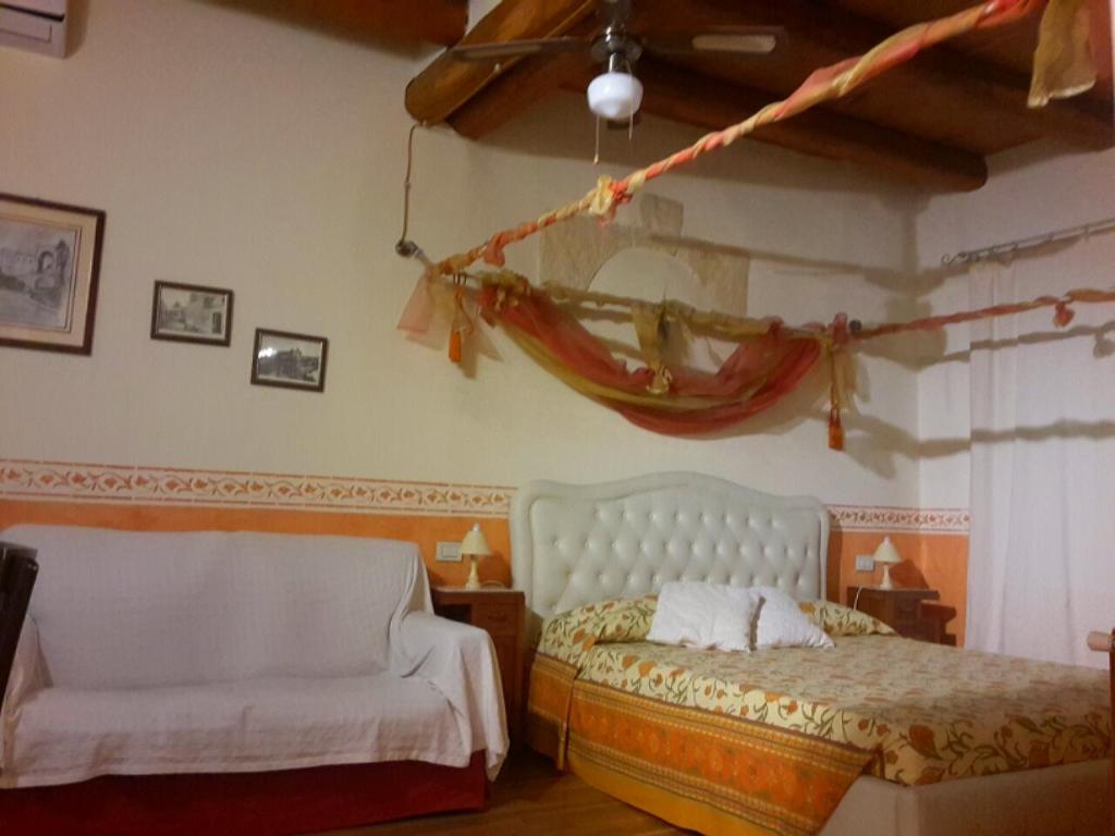 Een bed of bedden in een kamer bij Cagliari Dream