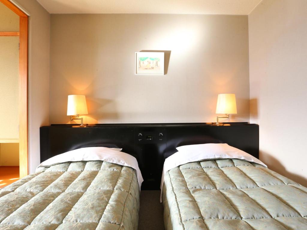 Hotel Silk Inn Madarao - Standard Family Room