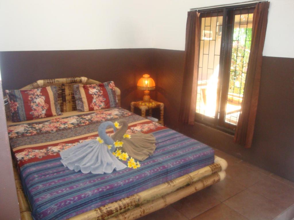 Postel nebo postele na pokoji v ubytování Relaxing Homestay