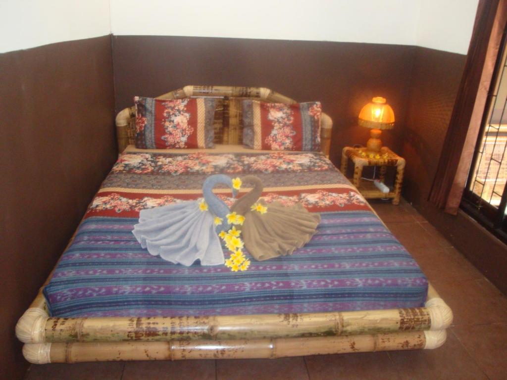 Postel nebo postele na pokoji v ubytování Relaxing Homestay