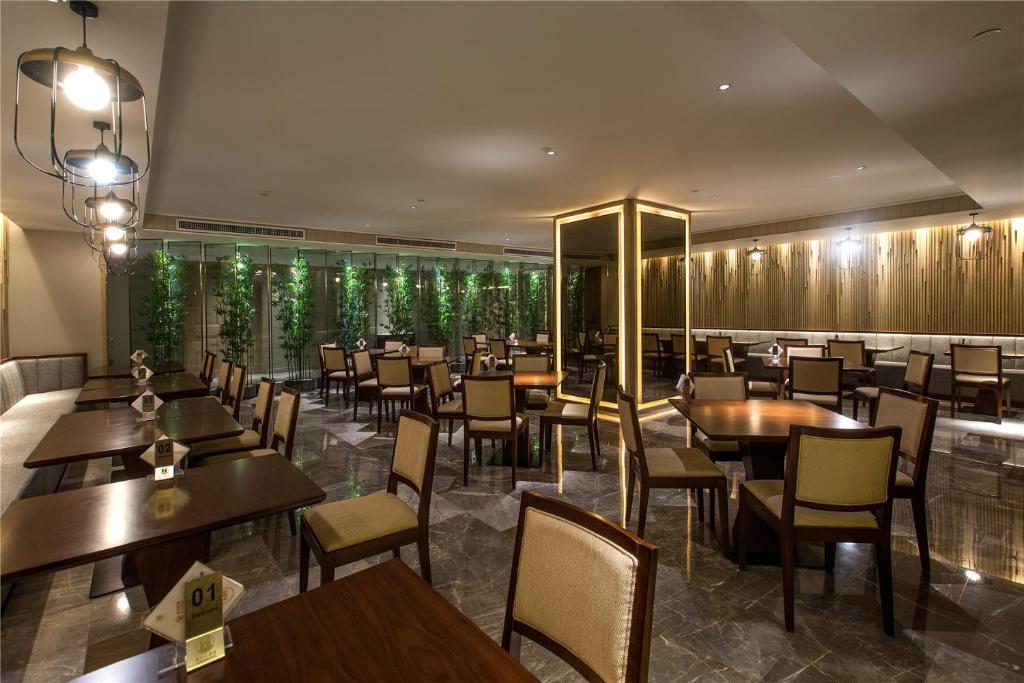 Restoran või mõni muu söögikoht majutusasutuses Wuhan Hongguang Hotel