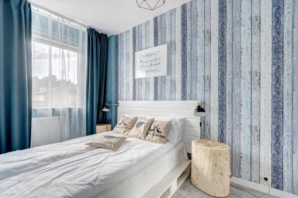 Posteľ alebo postele v izbe v ubytovaní Prime Apartments - Skandynawski