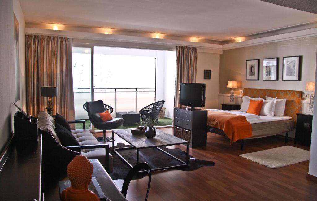 TV a/nebo společenská místnost v ubytování Hotel Feliz