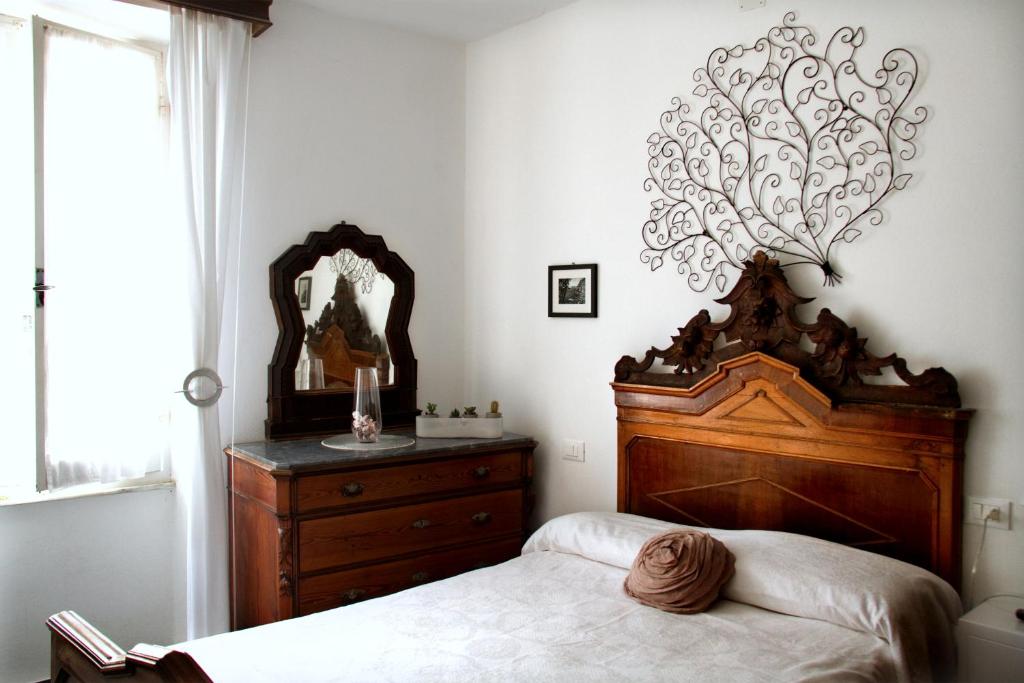 Postel nebo postele na pokoji v ubytování Guesthouse Rollando