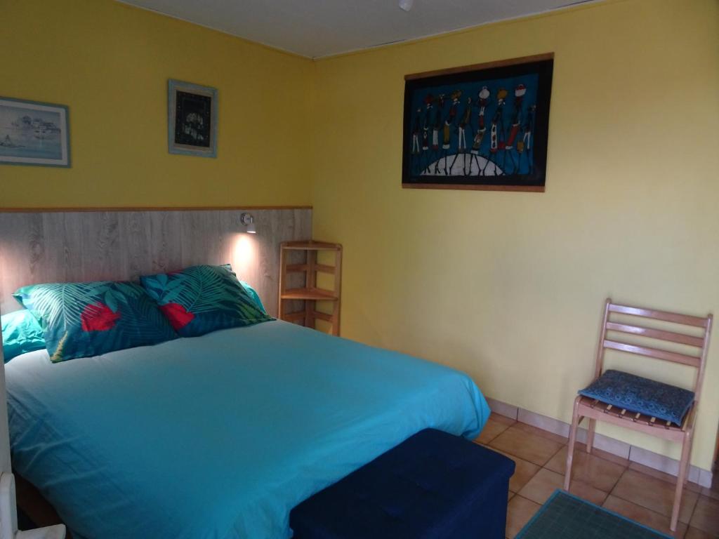 Postel nebo postele na pokoji v ubytování Relais du Volcan